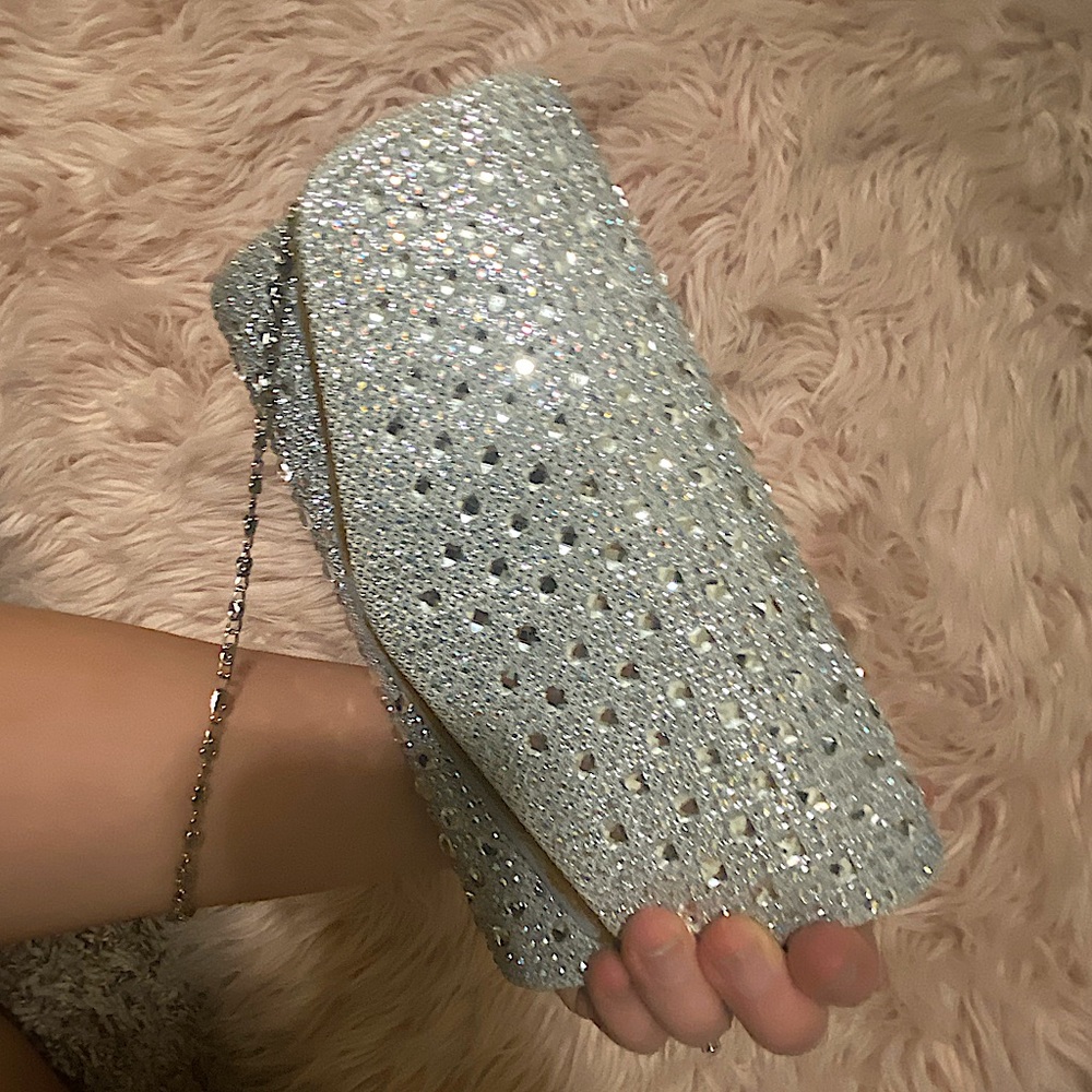 From burlington. Silver hand bag.